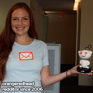 Alexis holding an orange envelope.