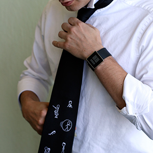 Tie being put on.